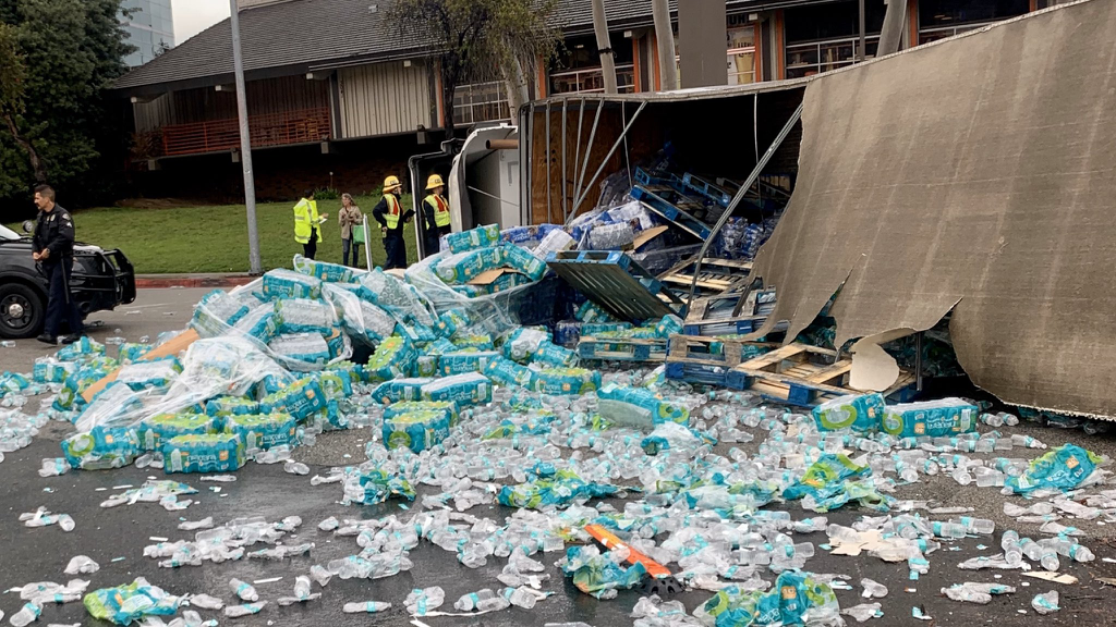 driver-flees-after-spilling-30-tons-of-bottled-water-in-west-covina-crash